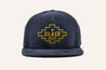 A Corduroy Hat with a Zilker Belts logo on it.