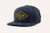 A Corduroy Hat with a Zilker Belts logo on it.