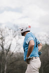 A baseball player wearing a Moontowers helmet from Zilker Belts.