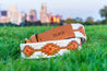 an ATX Light belt on the grass from Zilker Belts.